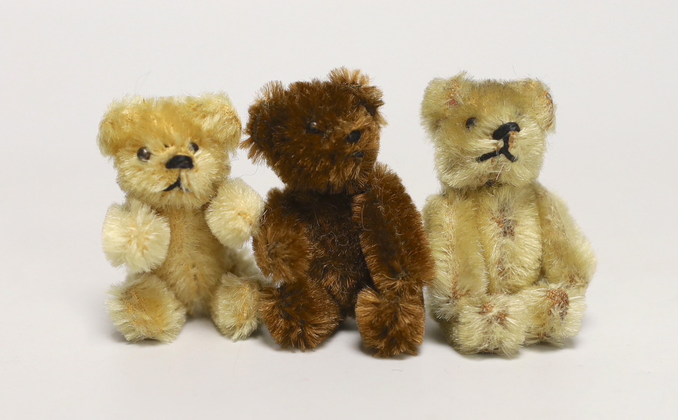 Three Schuco 1950's bears: two blonde, one brown, 3in.